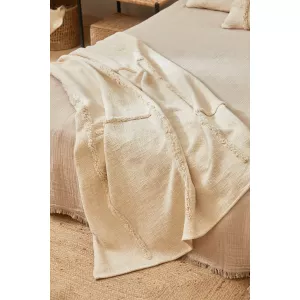 PLAID CON MOTIVO EN TUFTING CRUDO BAGUA