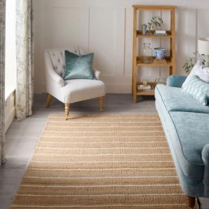 ALFOMBRA DE YUTE NATURAL TEJIDA A MANO.